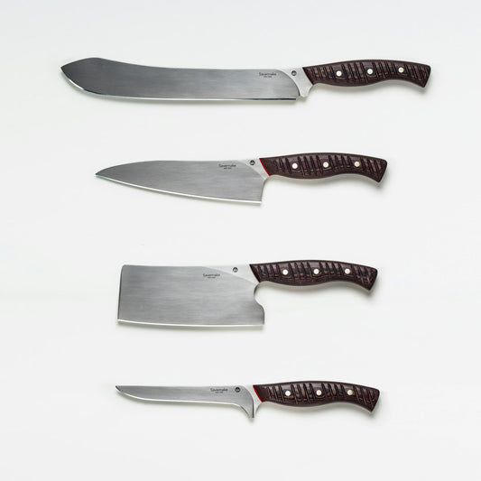 Collection of Japanese knives in various blade lengths on display