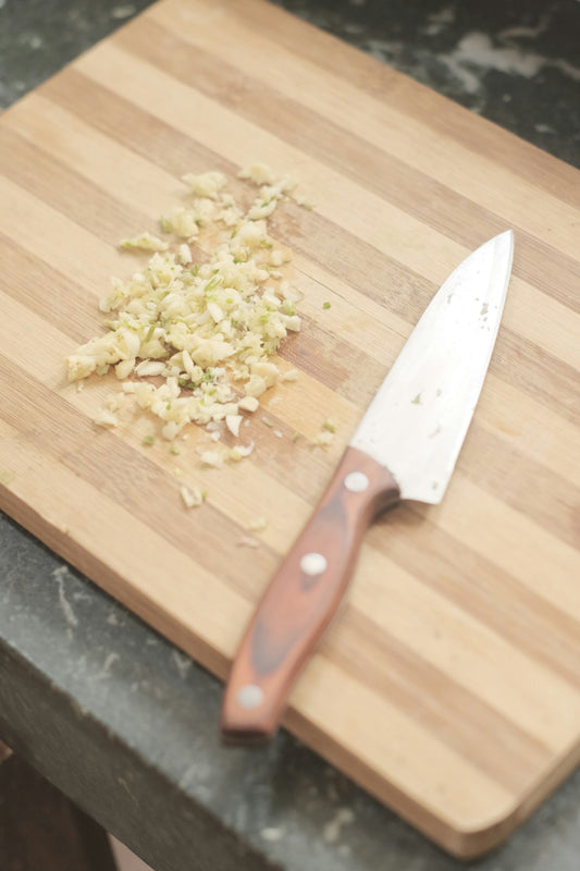 Breaking down a whole chicken with a sharp knife