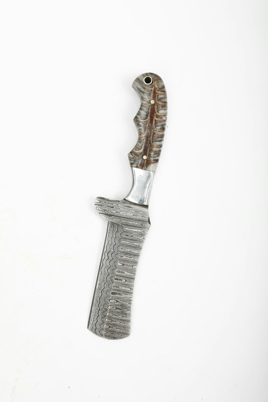 Damascus steel knife showing distinctive wave pattern on blade